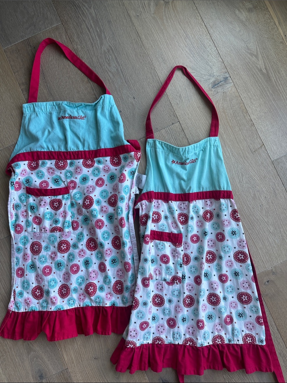 American Girl Aqua and Pink Patterned Kids Aprons with Ruffle Hem